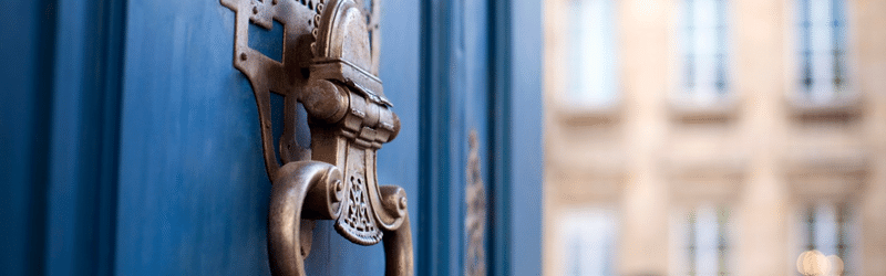 Image of blue door for blog post titled 'How to Improve your EPC rating: The Landlord’s Guide'